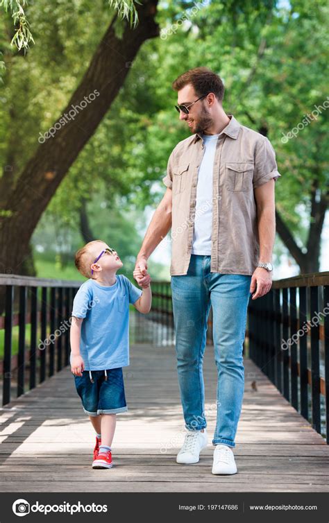 Pics Father Son Holding Hands Image Father Son Holding Hands Walking