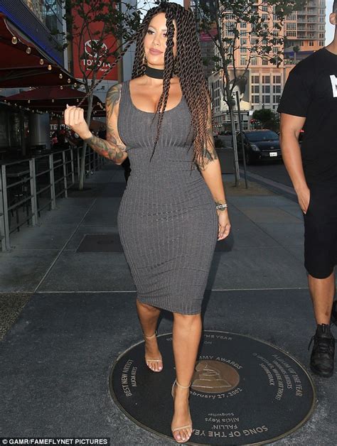 Amber Rose Showcases Her Wig While Flaunting Her Bountiful Curves In