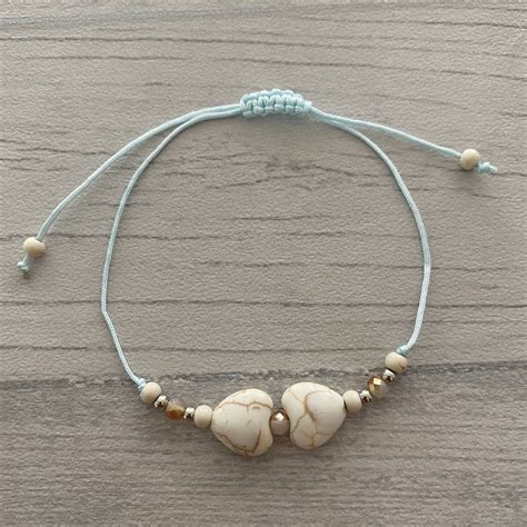 Pour bien nourrir les hommes, commençons par prendre soin de nos cultures et de nos animaux. Bracelet bleu cœur - itisbijoux.fr