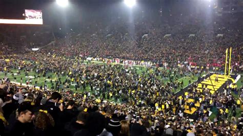 Iowa Fans Storm Field After Upset Win Vs Ohio State Youtube