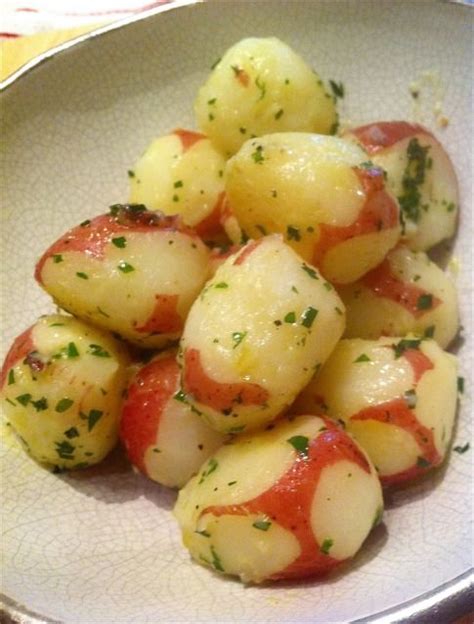 Red potatoes are baked with butter, garlic, lemon juice and parmesan cheese. Buttery Boiled Baby Red Potatoes with Herbs | Cooking red potatoes, Easy potato recipes, Red ...