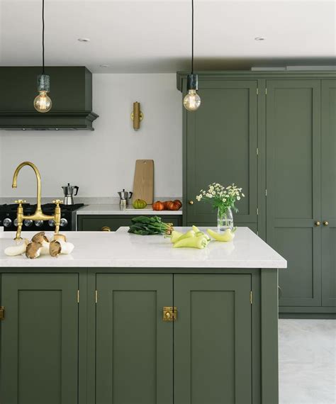 Think about resale value as well, since really unusual design choices might not resonate with potential buyers some day. deVOL Kitchens on Instagram: "A classic deep olive green ...