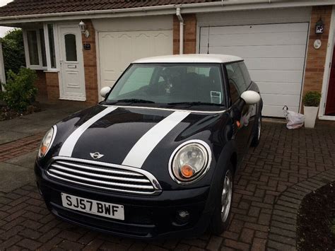 Black Mini Cooper With White Stripes Mini Cooper Cars