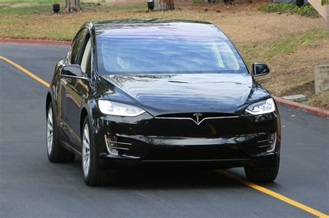 2016 Tesla Model X Debuts With 257 Mile Range Falcon Doors