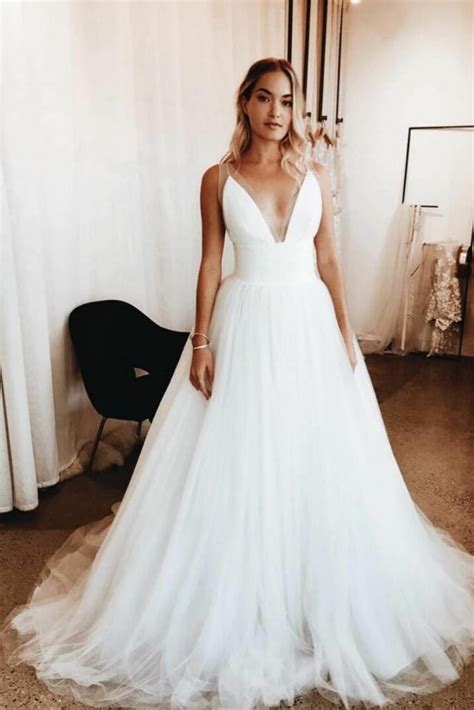 Https://tommynaija.com/wedding/as Is Tulle Wedding Dress With Plunging Vneck