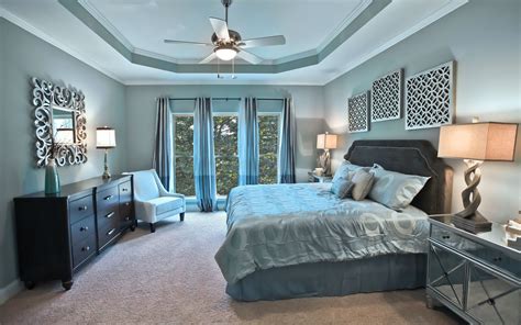 The Beautifully Decorated Master Bedroom Inside The Model Home At