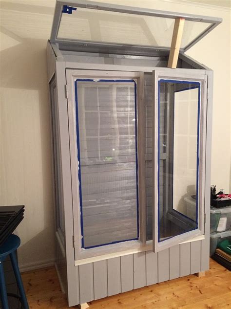 This diy mini box greenhouse is made from old storm windows. DIY Mini Greenhouse in 2020 | Mini greenhouse, Diy mini ...