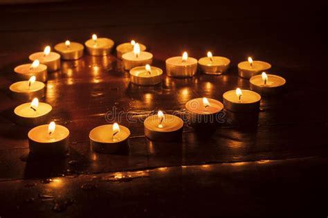 Candles Are Burning In The Dark On The Floor Stock Image Image Of