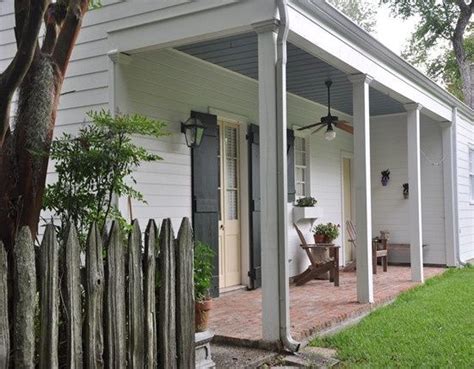 Acadian Cottage Courtyards And Exterior French Doors With Creole