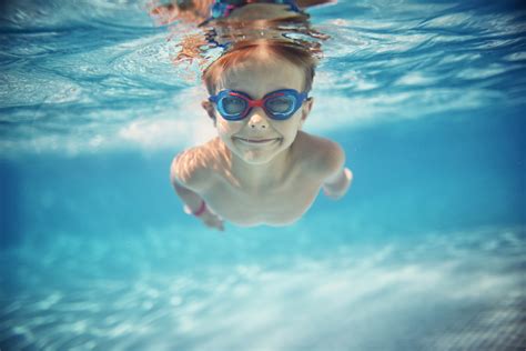 Little Boy Swimming Underwater In Pool Help Us Grow Wvu Medicine