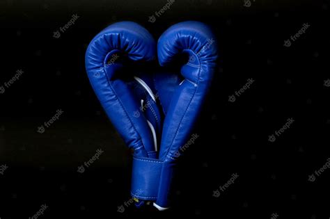 Premium Photo Boxing Gloves On A Black Background