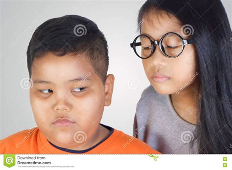 Young Girl Threaten Younger Kid Stock Image - Image of female, portrait ...