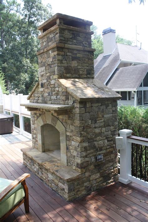 Chimney stack atop the roof of the almonry, ely. Outdoor Stacked Stone Fireplace with Hearth | Outdoor ...