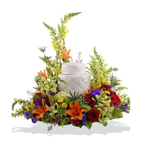 If you choose a funeral and burial, we'll provide a full range of options to assist. Colorful Cremation Urn Between Flowers Design Florist In ...