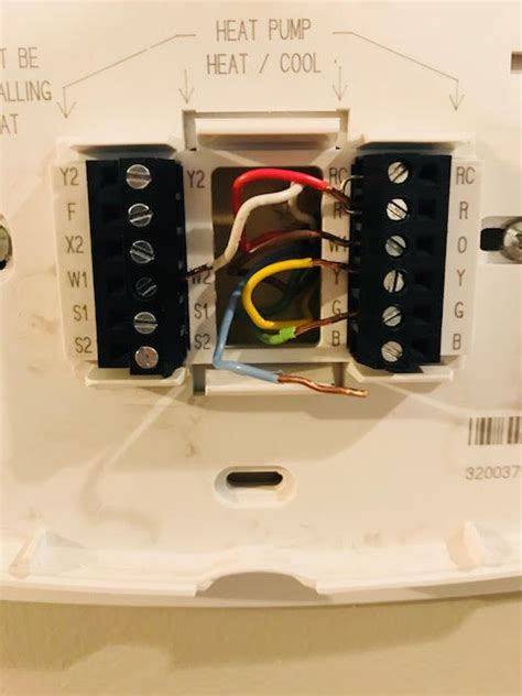 If you're unsure of your system voltage, you or a contractor should. electrical - Help wiring thermostat for heat pump - Home Improvement Stack Exchange