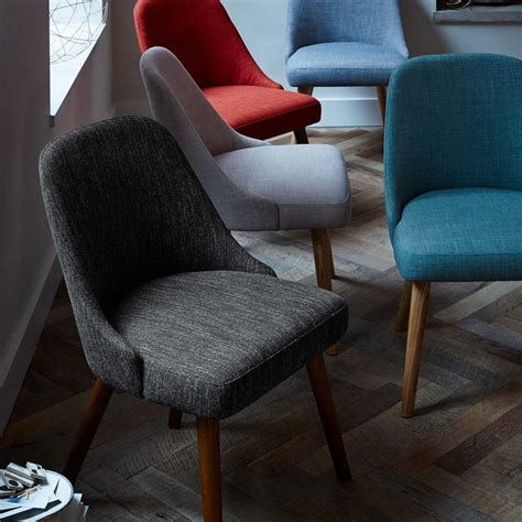 So they make it easier to entertain guests and get the little ones to eat up. Mid-Century Dining Chairs - Walnut Legs | west elm UK