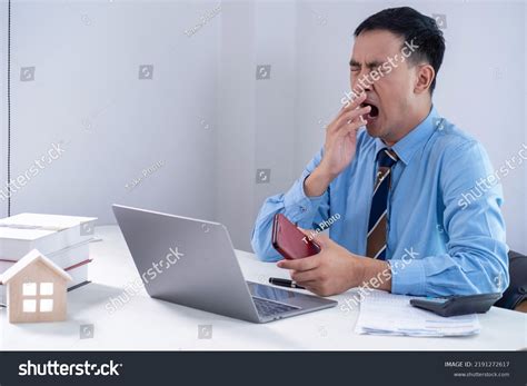 Shot Young Businessman Yawning Work Office Stock Photo 2191272617