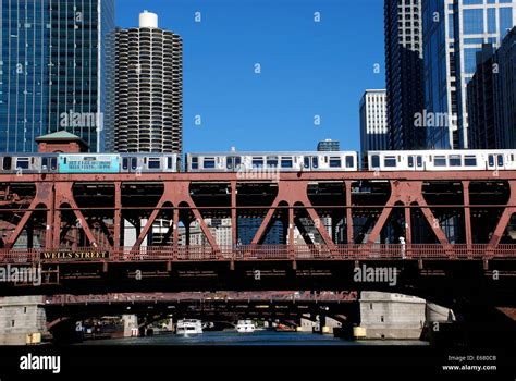 Chicago L Train Crossing Wells Street Bridge In Downtown Chicago With