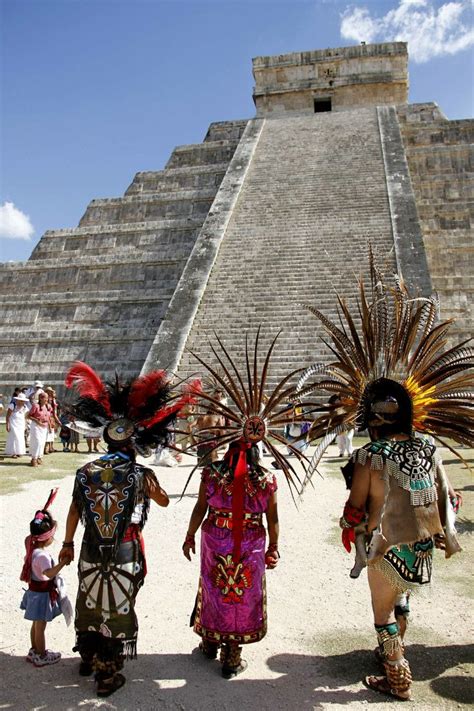 Dancers Perform In Front Of The Maya Temple Of Kukulkan El Castillo