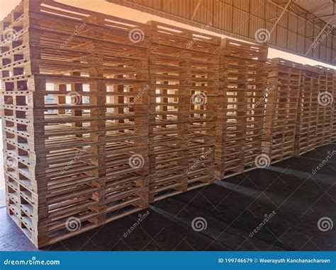 Wooden Pallets Stack In Warehouse Cargo Storage Shipment In Logistics