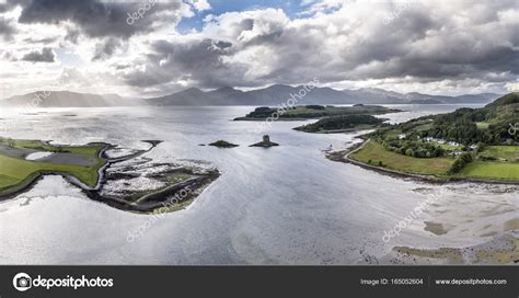 Aerial View Of Loch Laich With The Historic Castle Stalker In The