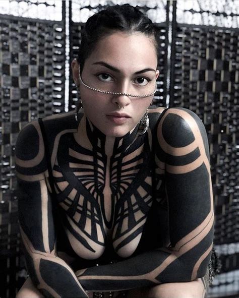 A Woman With Black And White Body Art