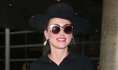 Amber Heard Rocks A Crop Top For Casual Airport Style Amber Heard