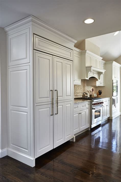 built  refrigerator  custom white cabinetry panels
