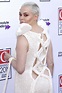 Rose McGowan goes braless in see-through sheer knitted dress leaving ...