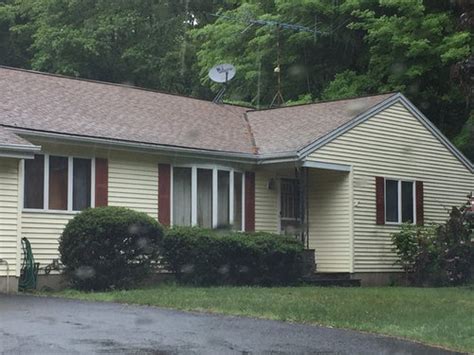 What are the different types of roofs, roof designs & roof materials? What color roof for yellow house