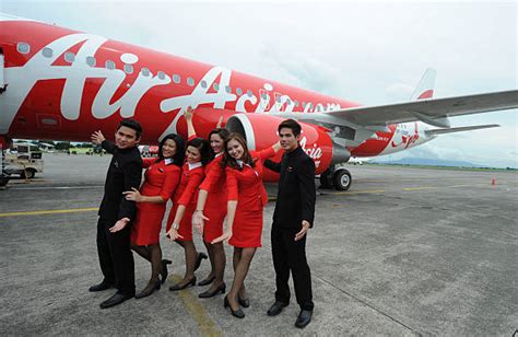 cabin crew of airasia philippines pose f pictures getty images