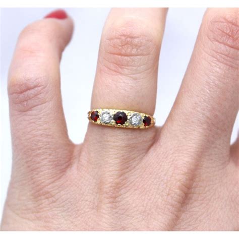 Garnet And Diamond Ring Set In 18ct Yellow Gold