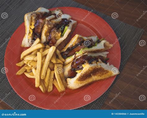 Smokey Bbq Chicken Club Sandwich With French Fries Stock Photo Image