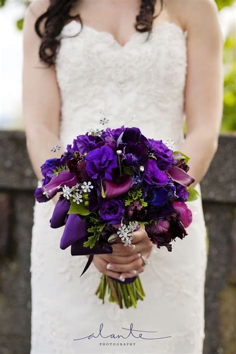 fall purple wedding flowers brides bouquet with purple and eggplant flowers purple bridal