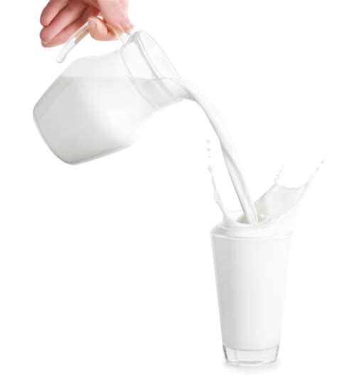 Pouring Milk Stock Photos Pictures And Royalty Free Images Istock