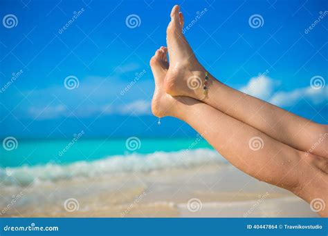 Close Up Of Female Feet On White Sandy Beach Stock Photo Image Of