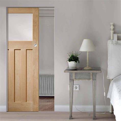 • the avanti comes in a natural black apricot wood veneer in horizontal direction, decorated with 4 silver strips and frosted glass. DX 1930's Oak Absolute Evokit Pocket Door - Frosted Glass ...