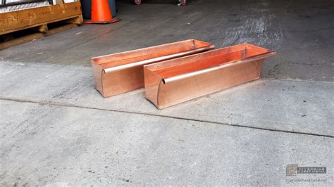 Classy formal appearance copper window boxes, title: Window flower boxes custom made to order in copper with a bead