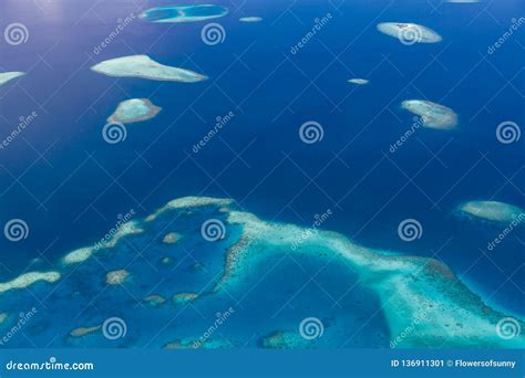 Maldives Atolls And Coral Reefs View From A Seaplane Calm Blue Sea And