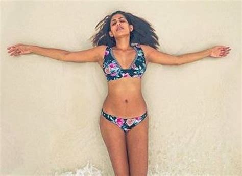 kubbra sait shares a bikini pic as she misses the photography session