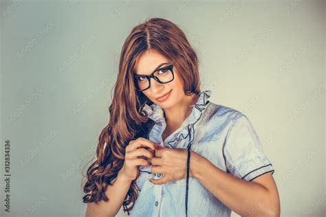 Sexy Woman Undressing Herself Looking Sexy And Flirty Photos Adobe Stock