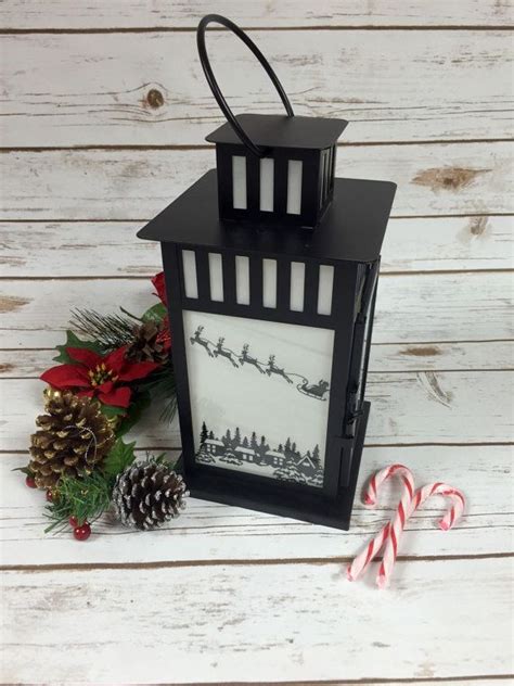 Christmas Decoration Holiday Lantern Santa And Reindeer Over Rooftops