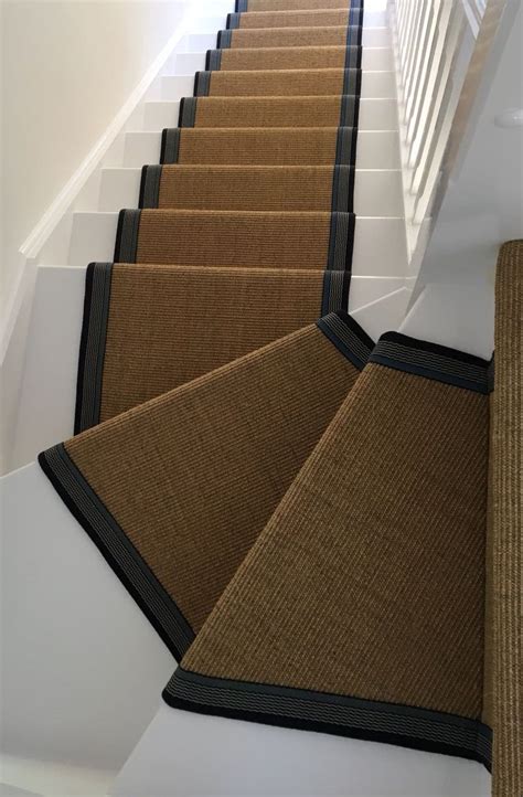 You can install jute stair runner the same way you would install regular blankets, which involves the use of course strips and a blanket stretcher to hold the runner in place. Sisal Carpet fitted as a bespoke taped stair runner with blue taping to white painted staircase ...