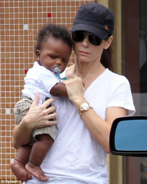 Sandra Bullock Carries Sleeping Baby Son Louis Round The Store Daily