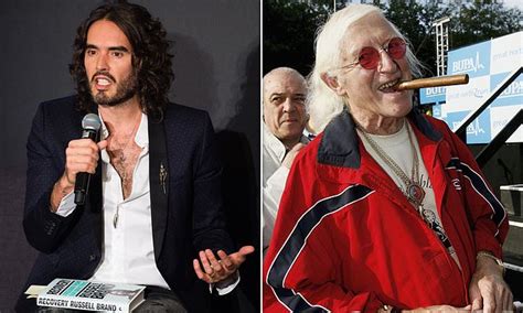 Listen To Moment Russell Brand Tells Jimmy Savile He Will Bring Along