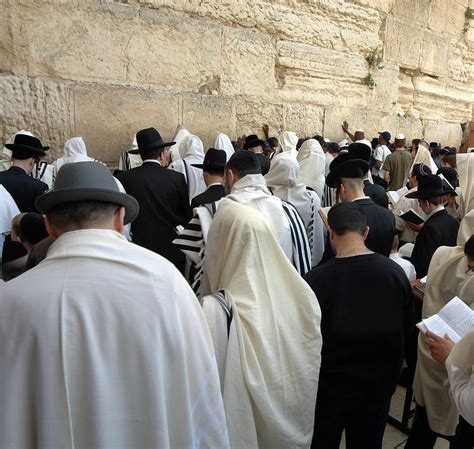 Jerusalem, a mosaic of different peoples, faiths, and nationalities. People At Wailing Wall Of Jerusalem by Stevenallan