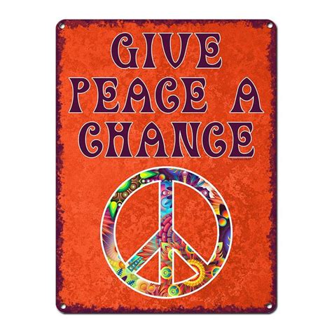 A Sign That Says Give Peace A Chance With A Peace Symbol In The Center