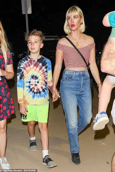 Sunday 4 September 2022 0949 Am January Jones Dons A Red Striped Crop Top In Outing With Son