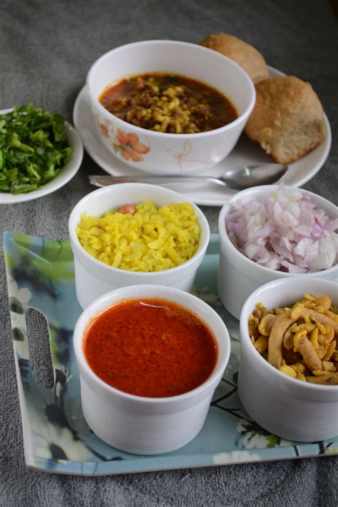 Once the oil is hot add onion, mix and saute till onion gets a light golden color. Kolhapuri Misal Pav Recipe / Maharashtrian Misal Pav Recipe - Gayathri's Cook Spot