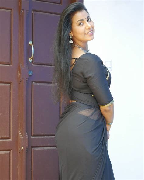 Shanaya Shannu Latest Black Saree Navel Photos